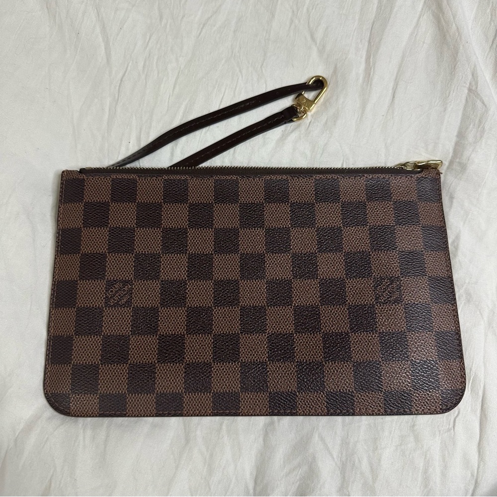 Louis Vuitton Damier Ebene Neverfull clutch/wristlet.